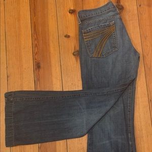 Medium wash gold Dojo 7 FAMK flare jeans